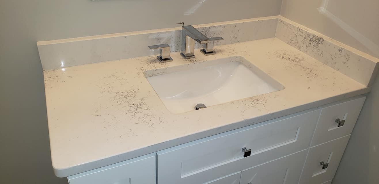 Image of remodeled bathroom sink and cabinets